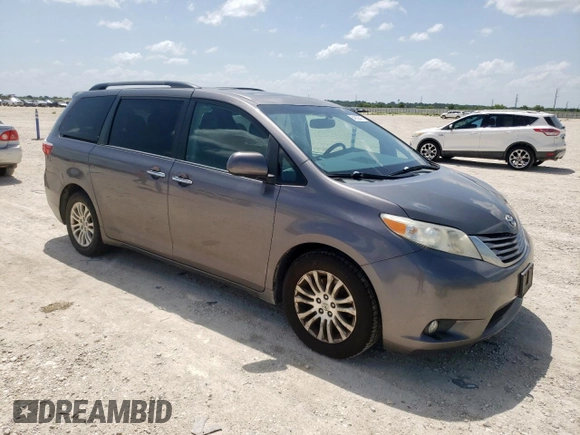 2015 Toyota Sienna XLE with VIN 5TDYK3DC4FS629558, listed as a Copart auction lot 64062045 with 172,669 mi miles and Clean title. Bid and sale history available at DreamBid. Image 4.