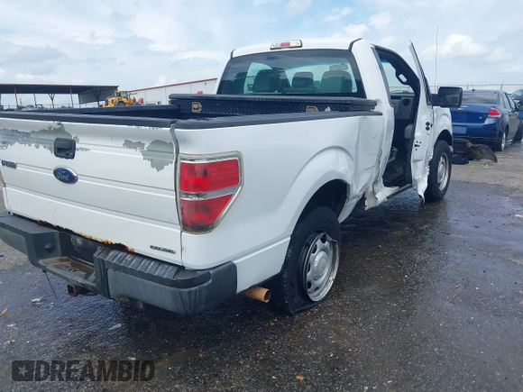 2014 Ford F-150 XL with VIN 1FTMF1CM1EKG31209, listed as a IAAI auction lot 42105573 with 187,162 mi miles and . Bid and sale history available at DreamBid. Image 4.