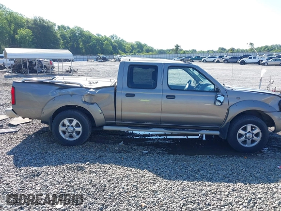 2003 Nissan Frontier SE z VIN 1N6ED29X43C402027, wystawiony jako IAAI lot #42252471 z przebiegiem 104 233 mil mil oraz . Historia ofert i sprzedaży dostępna na DreamBid. Obrazek 13.