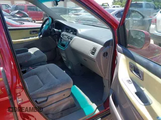 2003 Honda Odyssey EX with VIN 5FNRL18663B021888, listed as a IAAI auction lot 42343770 with 261,998 mi miles and . Bid and sale history available at DreamBid. Image 5.
