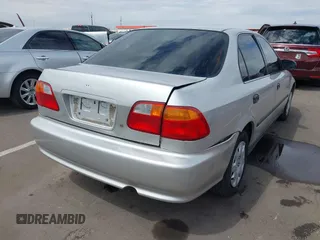 1999 Honda Civic LX with VIN JHMEJ6671XS003027, listed as a IAAI auction lot 41825146 with 197,764 mi miles and . Bid and sale history available at DreamBid. Image 6.