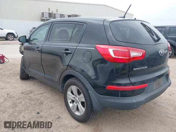 2013 Kia Sportage LX with VIN KNDPB3A20D7506063, listed as a IAAI auction lot 41796823 with 148,841 mi miles. Bid and sale history available at carsss.com. Image 3.