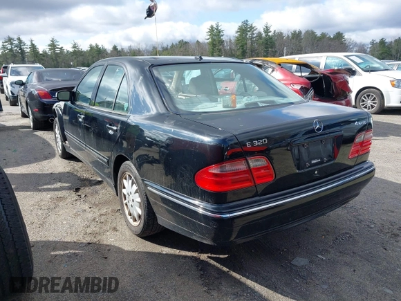 2000 Mercedes-Benz E-Class with VIN WDBJF82J2YX037818, listed as a IAAI auction lot 41910044 with 163,240 mi miles. Bid and sale history available at carsss.com. Image 3.