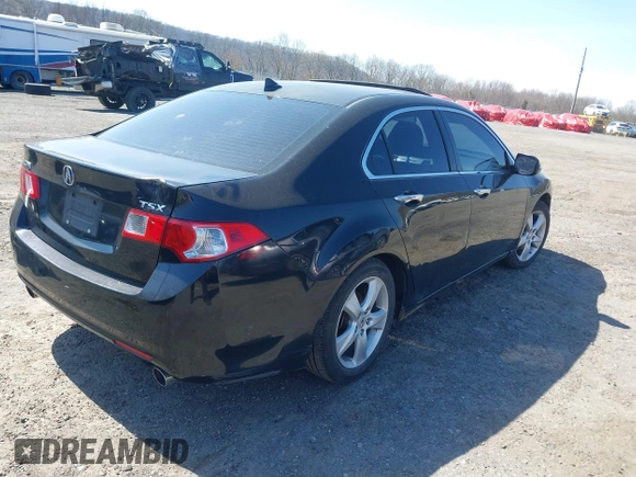 2009 Acura TSX with VIN JH4CU26699C030973, listed as a IAAI auction lot 42039769 with 298,307 mi miles. Bid and sale history available at carsss.com. Image 4.