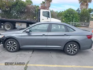 2024 Volkswagen Jetta S z VIN 3VW5M7BUXRM043609, wystawiony jako IAAI lot #42801058 z przebiegiem 26 943 mil mil oraz . Historia ofert i sprzedaży dostępna na DreamBid. Obrazek 15.