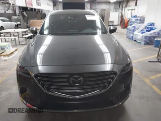 2017 Mazda CX-9 Grand Touring z VIN JM3TCADY2H0134070, wystawiony jako IAAI lot #41611243 z przebiegiem 87 046 mil mil oraz . Historia ofert i sprzedaży dostępna na DreamBid. Obrazek 12.