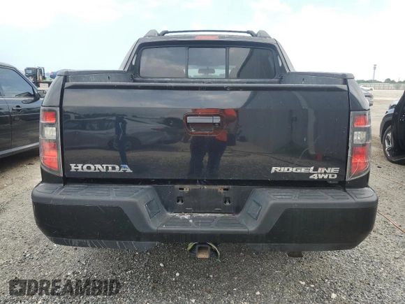 2014 Honda Ridgeline Sport with VIN 5FPYK1F75EB001197, listed as a Copart auction lot 65932295 with 121,862 mi miles and Salvage title. Bid and sale history available at DreamBid. Image 6.