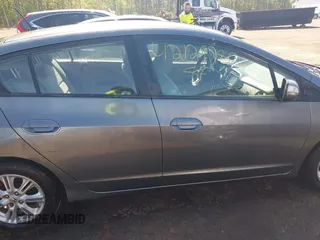 2010 Honda Insight EX with VIN JHMZE2H72AS021555, listed as a IAAI auction lot 42129289 with 172,829 mi miles and . Bid and sale history available at DreamBid. Image 14.