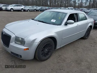 2009 Chrysler 300 Touring with VIN 2C3KA53V69H500462, listed as a IAAI auction lot 41896177 with 213,761 mi miles. Bid and sale history available at carsss.com. Image 2.