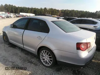 2009 Volkswagen Jetta Wolfsburg Edition with VIN 3VWRJ71K19M013277, listed as a IAAI auction lot 34707512 with 129,034 mi miles and . Bid and sale history available at DreamBid. Image 3.
