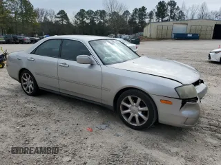 2003 Infiniti M45 with VIN JNKAY41E63M000613, listed as a Copart auction lot 41447045 with 310,520 mi miles and Salvage Title. Bid and sale history available at carsss.com. Image 4.