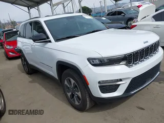 2023 Jeep Grand Cherokee with VIN 1C4RJYB63PC664077, listed as a IAAI auction lot 41686069 with 11,669 mi miles and . Bid and sale history available at DreamBid. Image 1.