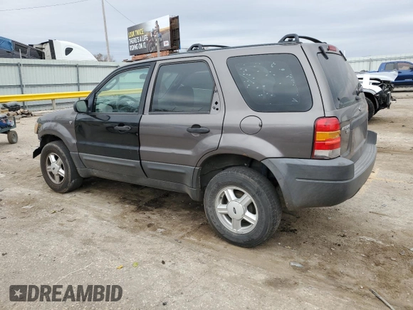 2002 Ford Escape XLS Choice with VIN 1FMYU02102KB67376, listed as a Copart auction lot 79109394 with 234,306 mi miles and Salvage title. Bid and sale history available at DreamBid. Image 2.