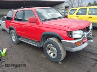 1996 Toyota 4Runner SR5 z VIN JT3HN86R0T0043030, wystawiony jako IAAI lot #41660826 z przebiegiem 237 859 mil mil oraz . Historia ofert i sprzedaży dostępna na DreamBid. Obrazek 1.