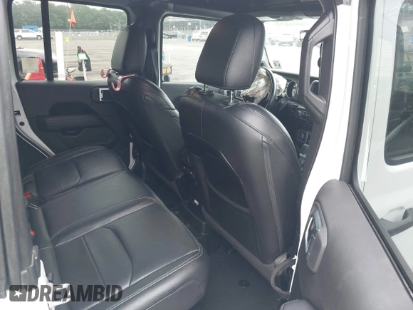 2022 Jeep Wrangler Unlimited Sahara with VIN 1C4JJXP69NW229124, listed as a IAAI auction lot 42525560 with 45,857 mi miles and . Bid and sale history available at DreamBid. Image 8.