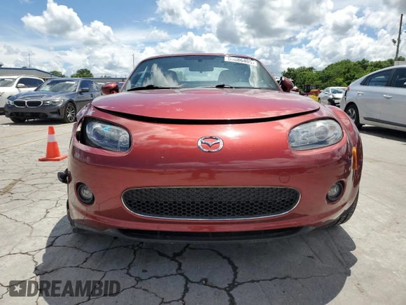 2008 Mazda MX-5 Miata Grand Touring z VIN JM1NC26F580144269, wystawiony jako Copart lot #56586405 z przebiegiem 52 871 mil mil oraz Szkoda całkowita • Salvage title. Historia ofert i sprzedaży dostępna na DreamBid. Obrazek 5.