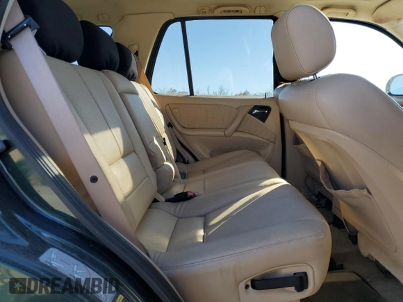 2001 Mercedes-Benz M-Class with VIN 4JGAB54E21A257928, listed as a Copart auction lot 77789424 with 98,228 mi miles and Clean Title. Bid and sale history available at carsss.com. Image 11.