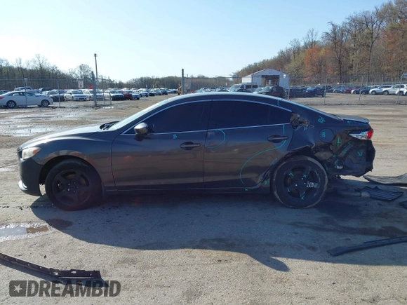 2016 Mazda 6 i Sport with VIN JM1GJ1U59G1402840, listed as a IAAI auction lot 41920724 with 147,527 mi miles and . Bid and sale history available at DreamBid. Image 14.