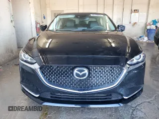 2021 Mazda 6 Carbon Edition with VIN JM1GL1WY9M1605756, listed as a Copart auction lot 46778355 with 60,063 mi miles and Salvage Title. Bid and sale history available at DreamBid. Image 5.