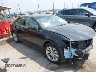 2014 Lexus ES 300h with VIN JTHBW1GGXE2047594, listed as a IAAI auction lot 41953019 with 108,267 mi miles and . Bid and sale history available at DreamBid. Image 1.