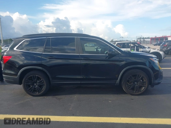 2022 Honda Pilot Special Edition with VIN 5FNYF5H25NB026414, listed as a IAAI auction lot 42590493 with 26,600 mi miles and . Bid and sale history available at DreamBid. Image 13.