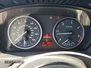 2011 BMW X5 35d with VIN 5UXZW0C58BL662048, listed as a Copart auction lot 55648975 with 166,291 mi miles and Salvage title. Bid and sale history available at DreamBid. Image 9.
