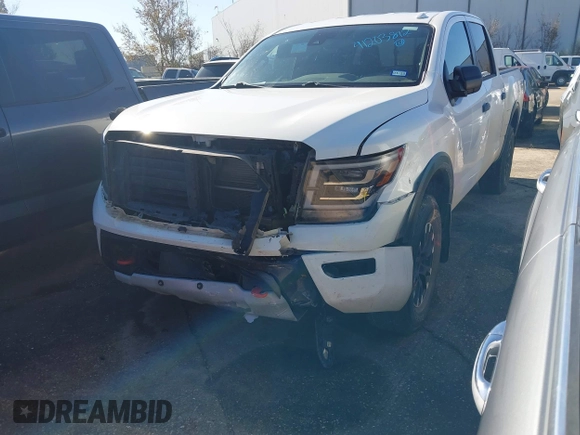 2021 Nissan Titan Pro-4X with VIN 1N6AA1ED5MN533759, listed as a IAAI auction lot 41203812 with 39,154 mi miles and . Bid and sale history available at DreamBid. Image 18.