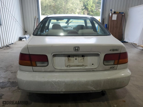1997 Honda Civic EX with VIN 1HGEJ8249VL022264, listed as a Copart auction lot 82634994 with 133,943 mi miles and Salvage Title. Bid and sale history available at carsss.com. Image 6.