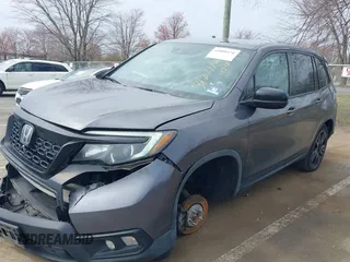 2019 Honda Passport Sport with VIN 5FNYF8H22KB012323, listed as a IAAI auction lot 41880476 with 153,341 mi miles and . Bid and sale history available at carsss.com. Image 2.