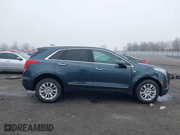 2019 Cadillac XT5 FWD with VIN 1GYKNARS5KZ220134, listed as a IAAI auction lot 41472927 with 58,229 mi miles and . Bid and sale history available at DreamBid. Image 13.
