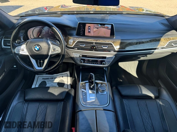 2016 BMW 7 Series 750i with VIN WBA7F0C53GGM20435, listed as a Copart auction lot 77656554 with 186,227 mi miles and Clean Title. Bid and sale history available at carsss.com. Image 9.