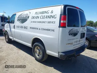 2014 Chevrolet Express Cargo Van with VIN 1GCWGFCA3E1130871, listed as a IAAI auction lot 42166083 with 279,624 mi miles. Bid and sale history available at carsss.com. Image 3.