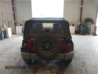 2009 Jeep Wrangler X with VIN 1J4FA24169L756377, listed as a IAAI auction lot 42718401 with 161,565 mi miles and . Bid and sale history available at DreamBid. Image 16.