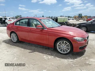 2014 BMW 3 Series 328i xDrive with VIN WBA3B3C59EJ977670, listed as a Copart auction lot 55281475 with 128,937 mi miles and Salvage Title. Bid and sale history available at carsss.com. Image 4.