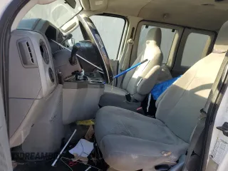 2011 Ford Econoline Passenger XL with VIN 1FBNE3BLXBDA42711, listed as a Copart auction lot 44326425 with 476,137 mi miles and Salvage Title. Bid and sale history available at carsss.com. Image 7.