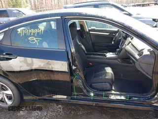 2020 Honda Civic LX with VIN 2HGFC2F69LH532499, listed as a IAAI auction lot 41919941 with 96,936 mi miles and . Bid and sale history available at DreamBid. Image 14.