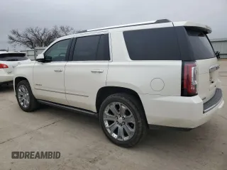 2015 GMC Yukon Denali with VIN 1GKS1CKJ5FR293612, listed as a Copart auction lot 47625975 with 98,533 mi miles and Salvage Title. Bid and sale history available at carsss.com. Image 2.