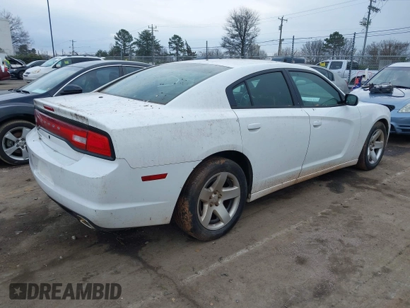 2013 Dodge Charger Police with VIN 2C3CDXAT8DH555397, listed as a IAAI auction lot 41487802 with 117,577 mi miles and . Bid and sale history available at DreamBid. Image 4.