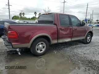 2003 Ford F-150 XLT with VIN 1FTRW07673KA75061, listed as a Copart auction lot 52034595 with Not Provided miles and Salvage Title. Bid and sale history available at carsss.com. Image 3.