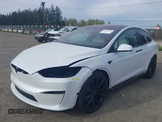 2022 Tesla Model X with VIN 7SAXCBE54NF363113, listed as a IAAI auction lot 41978397 with 27,166 mi miles. Bid and sale history available at carsss.com. Image 6.