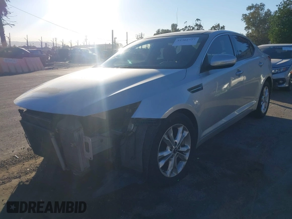 2012 Kia Optima EX with VIN 5XXGN4A67CG071208, listed as a IAAI auction lot 41302757 with 99,209 mi miles and . Bid and sale history available at carsss.com. Image 2.