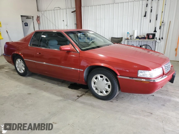 1996 Cadillac Eldorado z VIN 1G6EL12Y3TU620055, wystawiony jako Copart lot #72387994 z przebiegiem 128 641 mil mil oraz Czysty tytuł • Clean title. Historia ofert i sprzedaży dostępna na DreamBid. Obrazek 4.