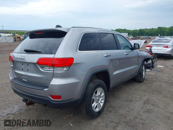 2016 Jeep Grand Cherokee Laredo with VIN 1C4RJFAG3GC366613, listed as a IAAI auction lot 42503974 with 156,013 mi miles and . Bid and sale history available at DreamBid. Image 4.