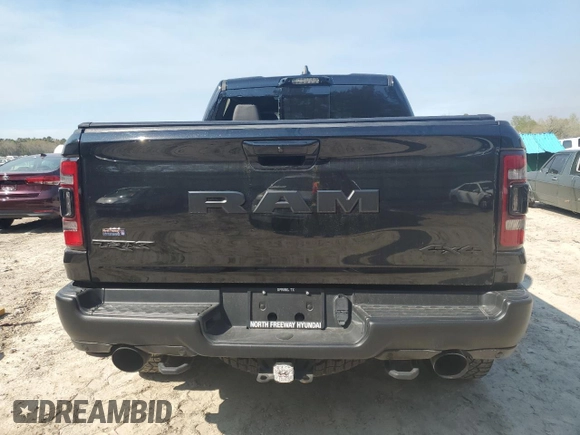 2022 Ram 1500 TRX with VIN 1C6SRFU99NN430718, listed as a Copart auction lot 49576035 with 29,476 mi miles and Salvage title. Bid and sale history available at DreamBid. Image 6.