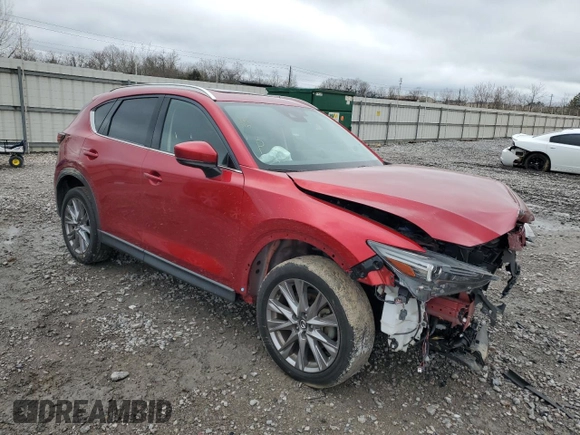 2021 Mazda CX-5 Grand Touring Reserve with VIN JM3KFBAY5M0313517, listed as a Copart auction lot 42815805 with 34,028 mi miles and Salvage Title. Bid and sale history available at carsss.com. Image 4.