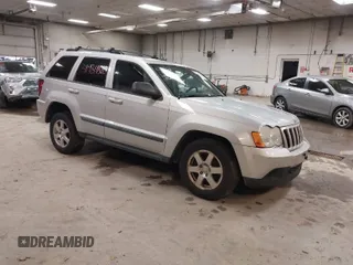 2009 Jeep Grand Cherokee Laredo with VIN 1J8GR48K89C553694, listed as a IAAI auction lot 41984820 with 196,266 mi miles. Bid and sale history available at carsss.com. Image 1.