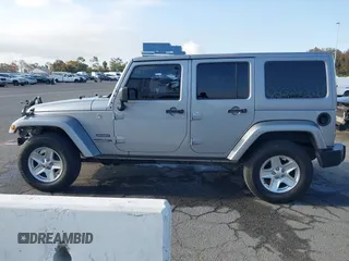2018 Jeep Wrangler Unlimited Sport S with VIN 1C4HJWDG5JL839703, listed as a IAAI auction lot 42140205 with 61,604 mi miles and . Bid and sale history available at DreamBid. Image 15.