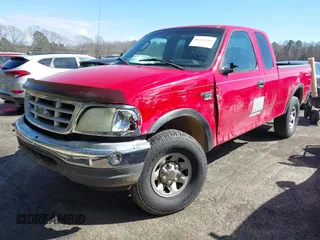 2003 Ford F-150 XL with VIN 1FTPX18LX3NB05456, listed as a IAAI auction lot 41787506 with 228,529 mi miles. Bid and sale history available at carsss.com. Image 2.
