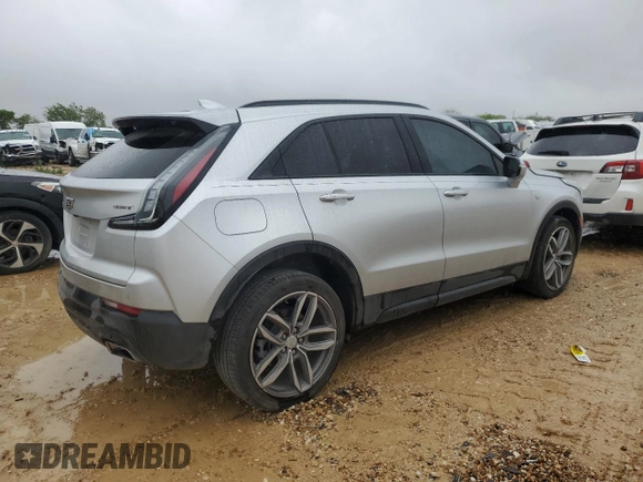 2022 Cadillac XT4 FWD Sport with VIN 1GYFZER47NF111047, listed as a Copart auction lot 50958135 with 14,448 mi miles and Salvage Title. Bid and sale history available at carsss.com. Image 3.