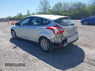 2012 Ford Focus SE with VIN 1FAHP3K27CL333433, listed as a IAAI auction lot 42140452 with 156,048 mi miles and . Bid and sale history available at carsss.com. Image 3.